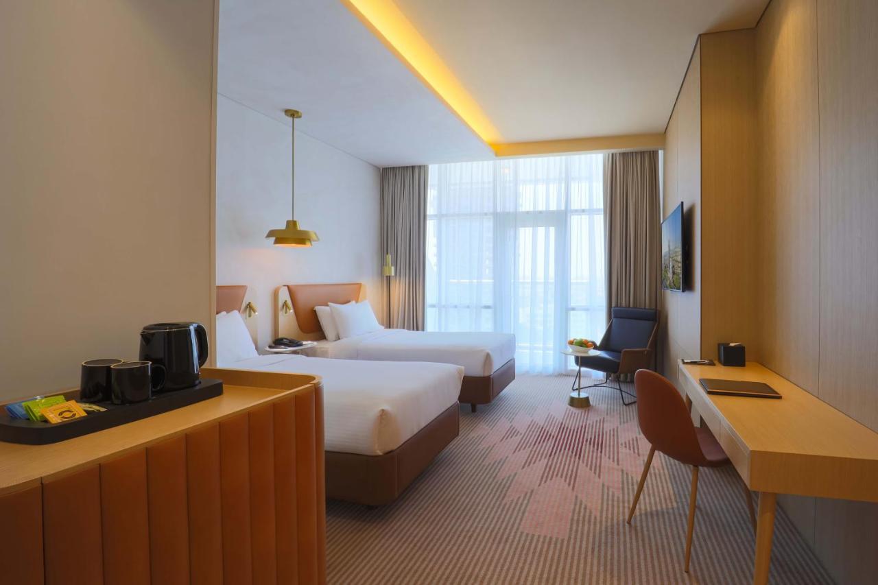 Novotel Jumeirah Village Triangle Dubai Exterior photo