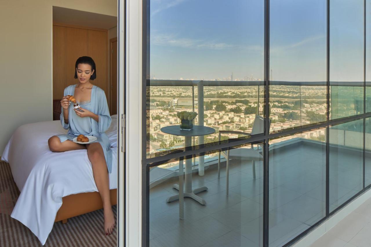 Novotel Jumeirah Village Triangle Dubai Exterior photo