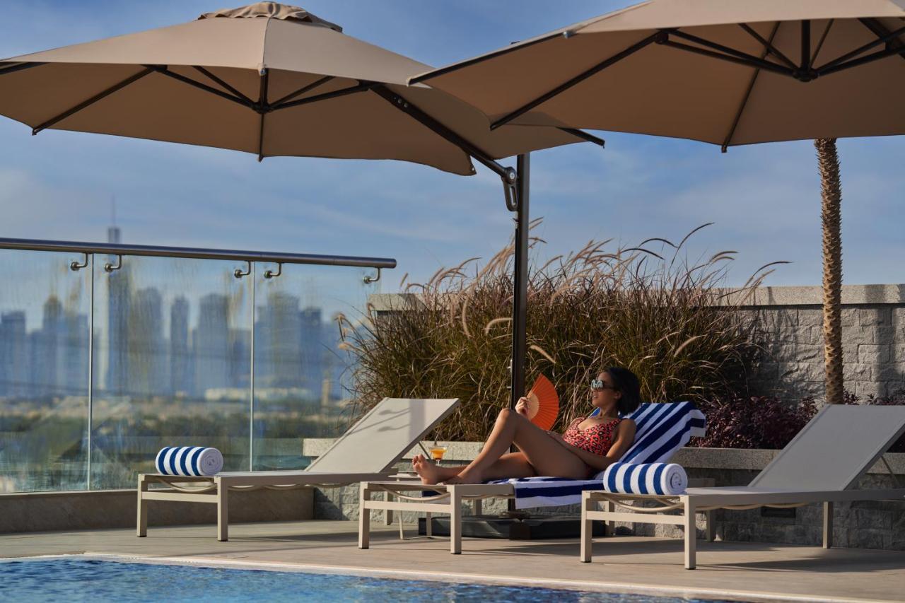 Novotel Jumeirah Village Triangle Dubai Exterior photo